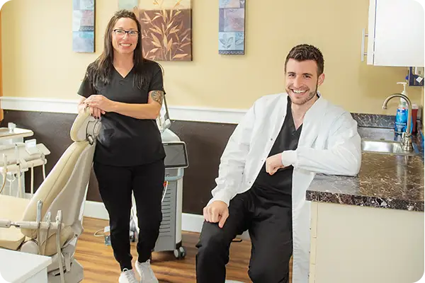 Dentist and team member in a treatment room