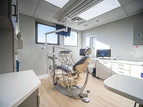 Transformed living room with modern decor and improved lighting.