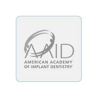 Accreditations and awards displayed for Birmingham Smiles dental practice.