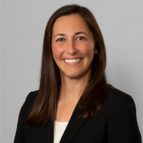 Headshot of Dr. Alexandra Polus, DMD, MS, smiling professionally.